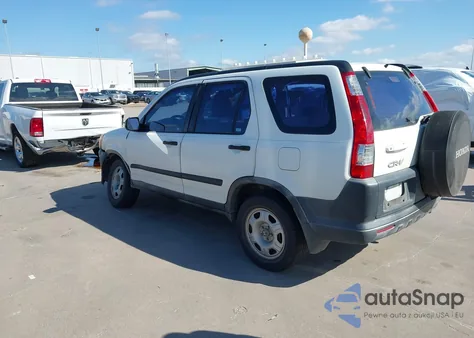 2005 Honda Cr-V Lx z USA, uszkodzony, nr VIN JHLRD685X5C018335